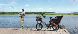 The Engwe LE20 cargo electric bike parked by a lake, illustrating its use for leisure activities like fishing.