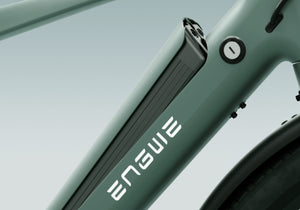 Close-up of the Engwe MapFour N1 Air e-bike frame showcasing the removable 250W lithium-ion battery, designed for a 100KM range and seamless charging.