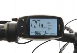 LCD display on the Wisper 905 Touring electric bike showing speed, trip distance, and power assist level.